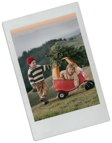 Colette's boys playing with a red wagon