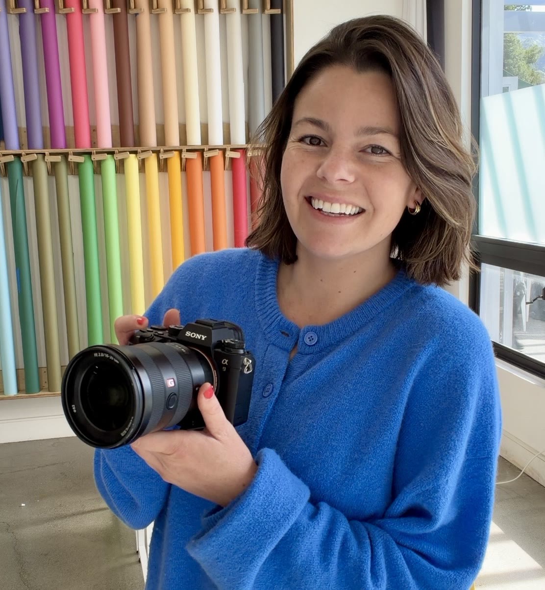 Colette Peri holding her Sony camera