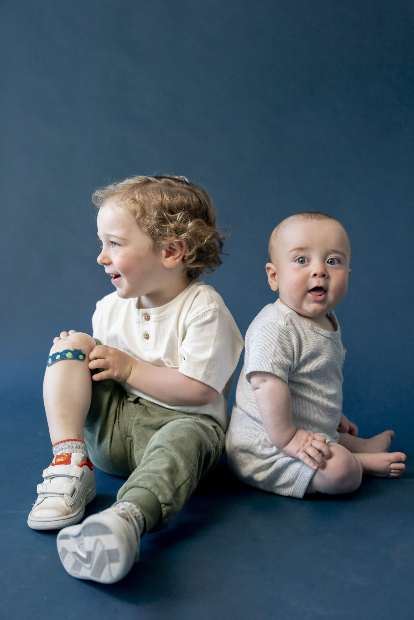 Kids personality portrait on a colored studio background by Colette Peri
