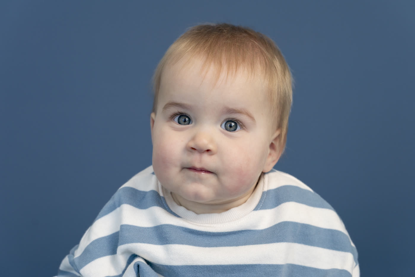 Kids personality portrait on a colored studio background by Colette Peri