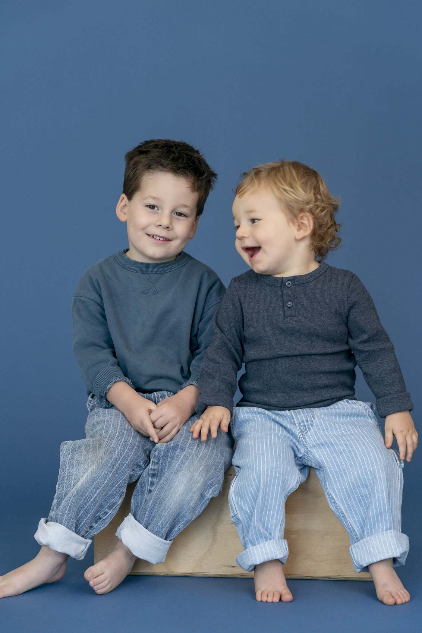 Kids personality portrait on a colored studio background by Colette Peri