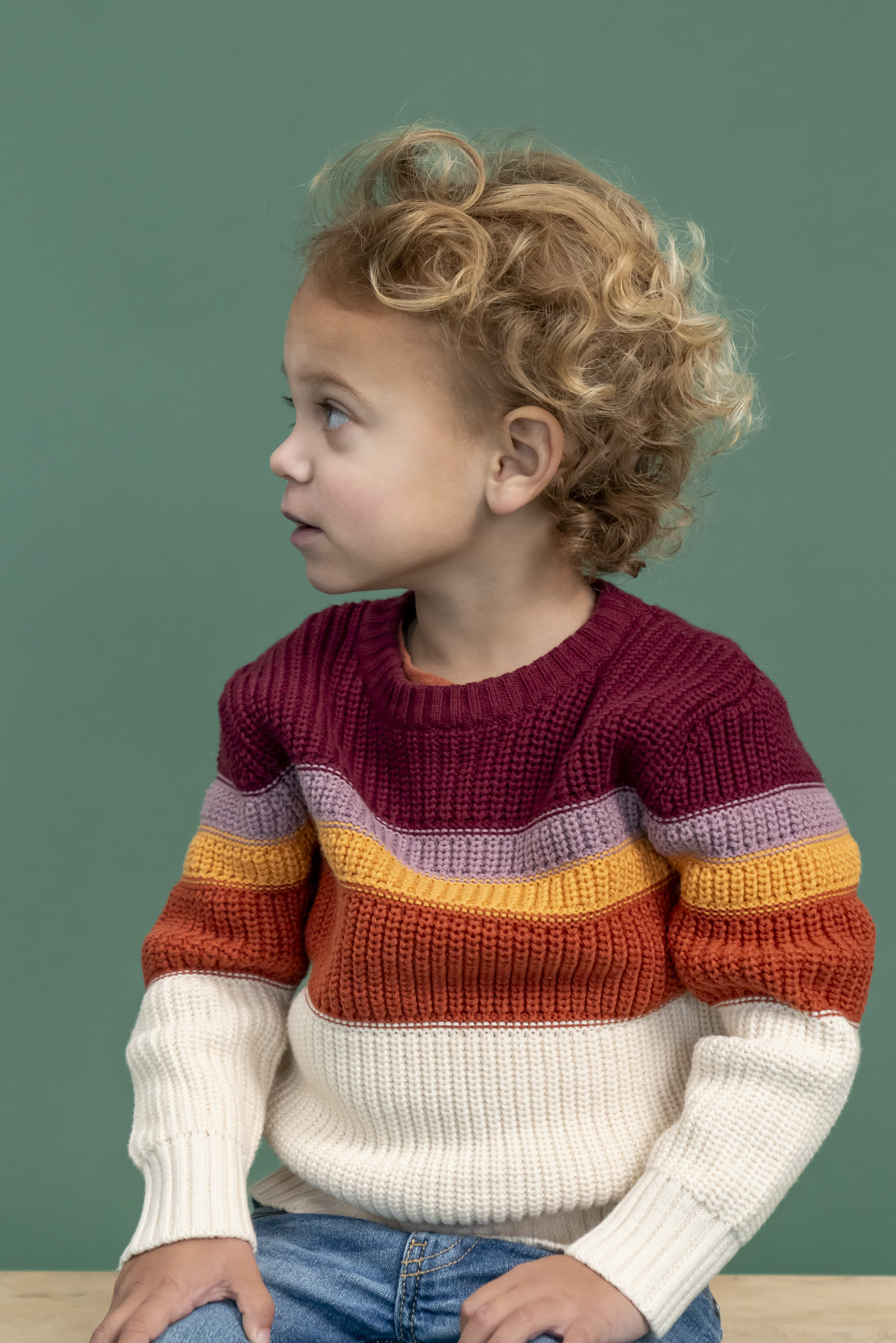 Kids personality portrait on a colored studio background by Colette Peri