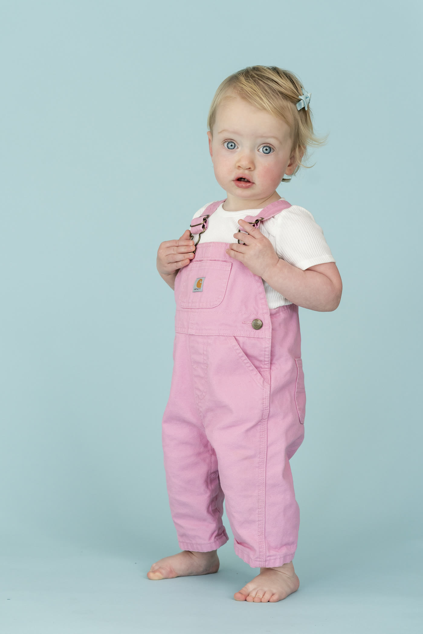 Kids personality portrait on a colored studio background by Colette Peri